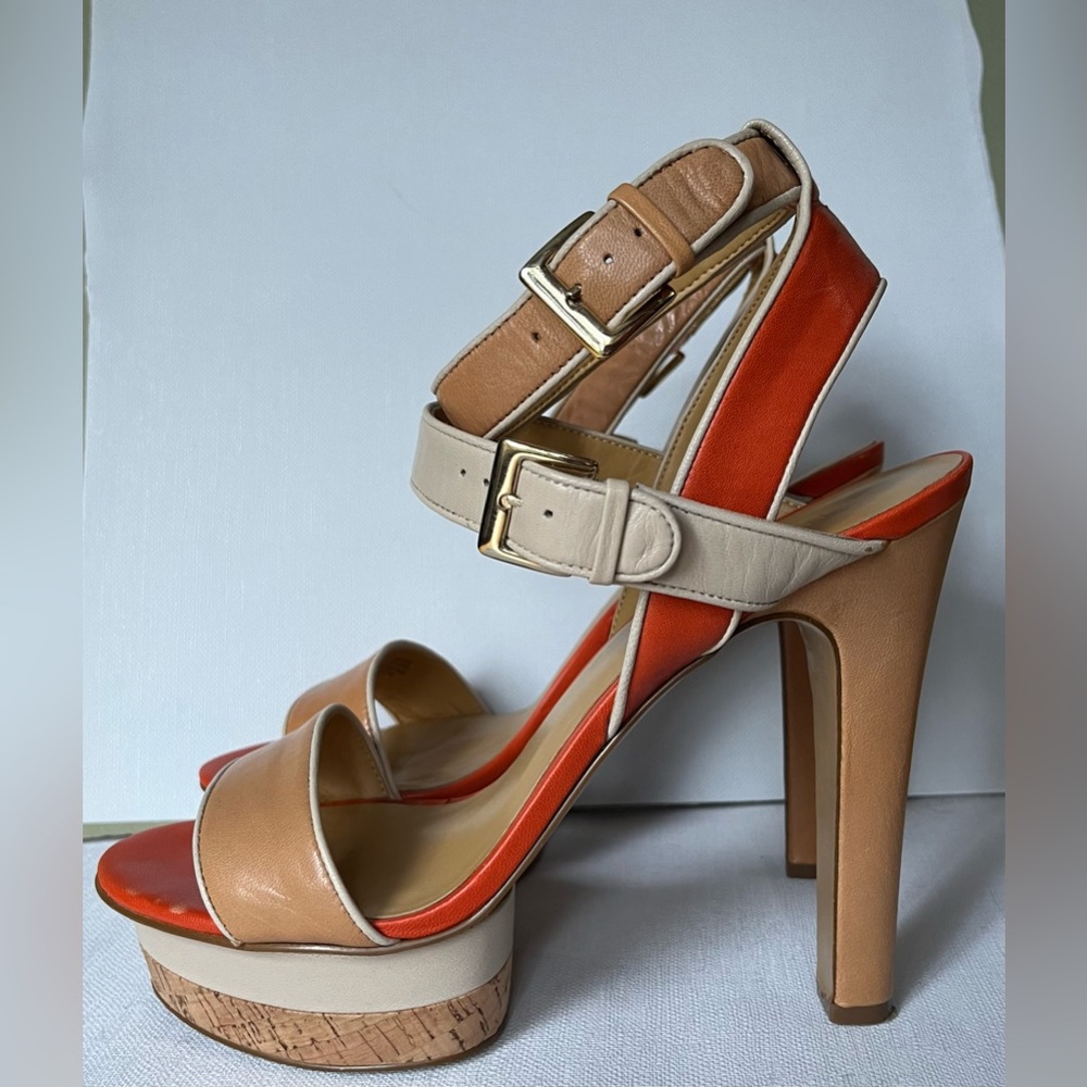 Orange with gold accents, platform.